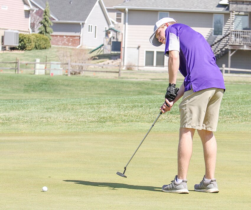 Kellen Kubicek of Milford watches a birdie putt rolls across the ninth green at Thornridge Golf Course in Milford April 12.