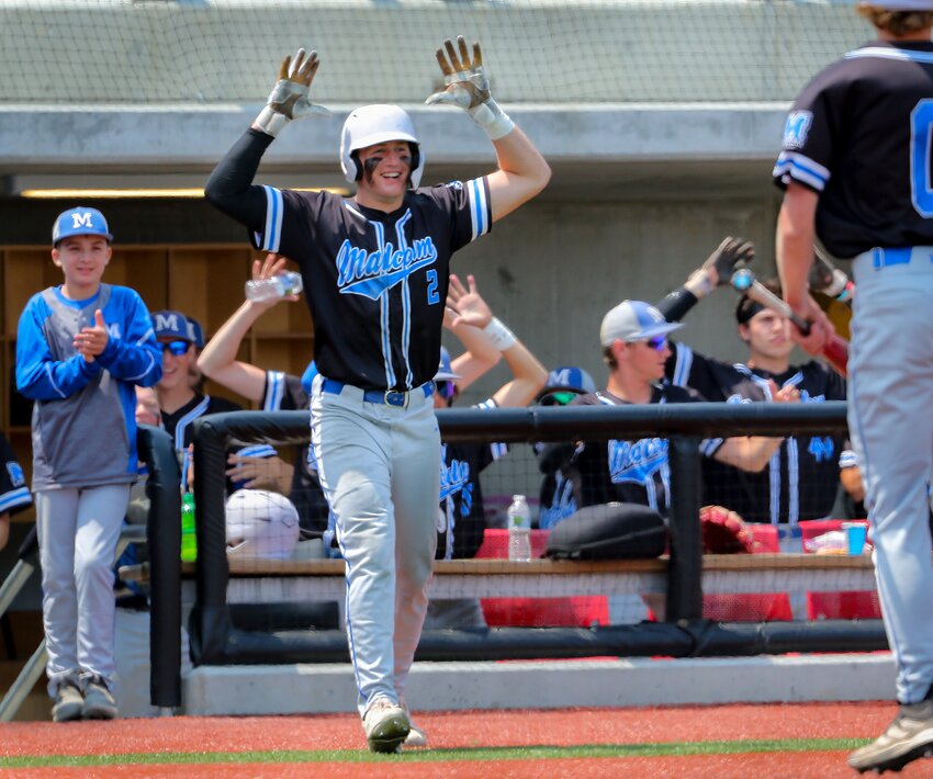 Malcolm's Hayden Frank celebrates a score in the Class C state championship game.