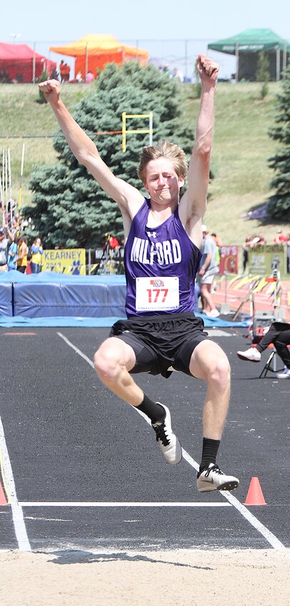 Dane Kolb looks for the sand in the Class C long jump May 20 at state. He also ran the anchor leg on the 4x100-meter relay.