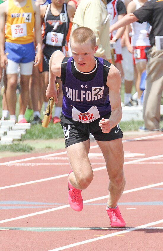 Isaac Roth leaves the starting line in the 4x800-meter relay May 19.