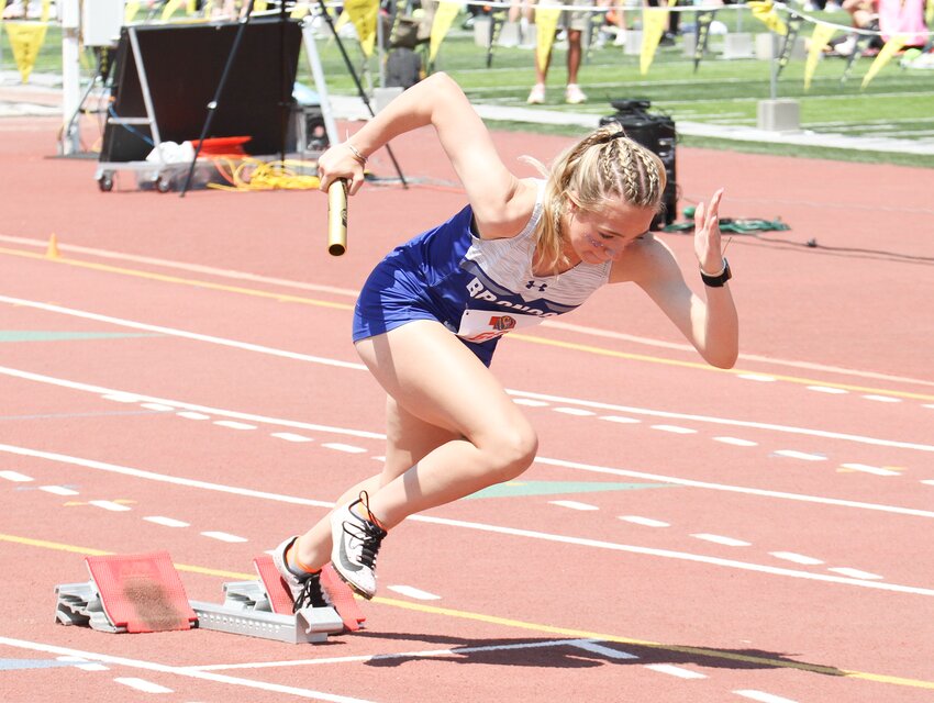 Cambria Saunders of Centennial leaves the blocks in the 4x100-meter relay May 20.