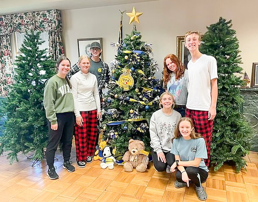 The Seward High FFA finished its Christmas tree for the annual GFWC Seward Woman’s Club’s Festival of Trees, which opens Saturday, Nov. 25, at 9 a.m. at the Seward Civic Center. Pictured are, from left: (kneeling) Ella Kossow and Bree Geschke; and (standing) Kaleigh Penas, Bailey Foltz, Garrett Ostrander, Skylar Mayfield and Esten Johnsen.