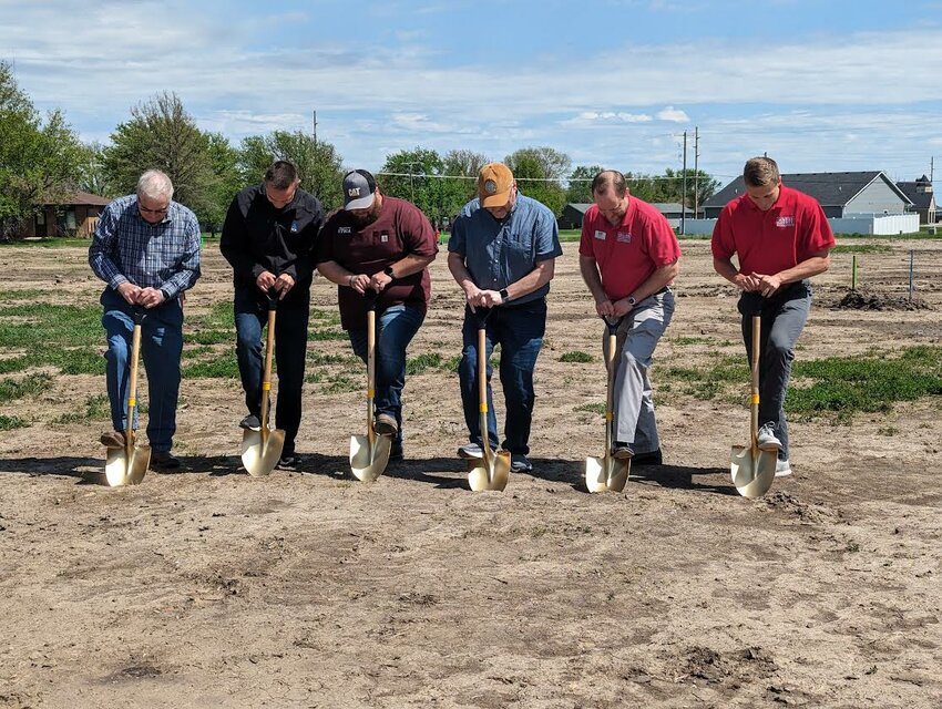 Local dignitaries plunge golden shovels into the dirt at a May 3 groundbreaking ceremony for Bronco Heights, a new 14-lot subdivision planned in Utica. Pictured are, from left: Jim Swanson, Utica Village Board chair; Logan Faller, on-site construction manager for Short Elliot Hendrickson Inc., the project’s civil engineering firm; Dylan Wiemer, maintenance supervisor for the Village of Utica, Brad Wiese, housing specialist with the Nebraska Department of Economic Development; Jonathan Jank, president and CEO of the Seward County Chamber and Development Partnership; and Jacob Jennings, vice president and director of community affairs for the SCCDP.