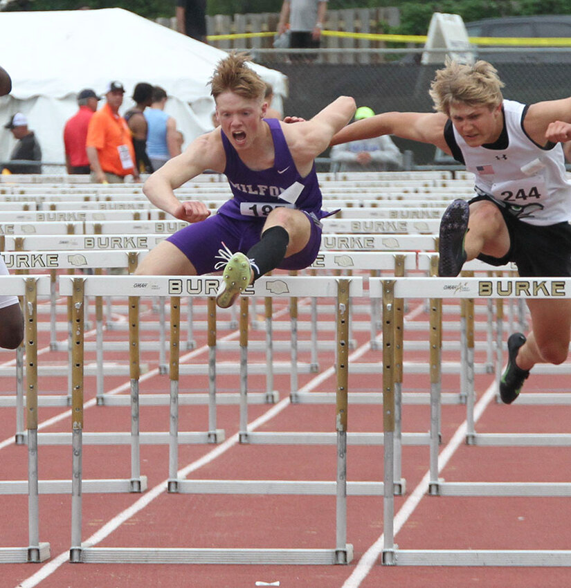 Isaac Roth clears the final hurdle in the 110-meter hurdle prelims at state May 15.