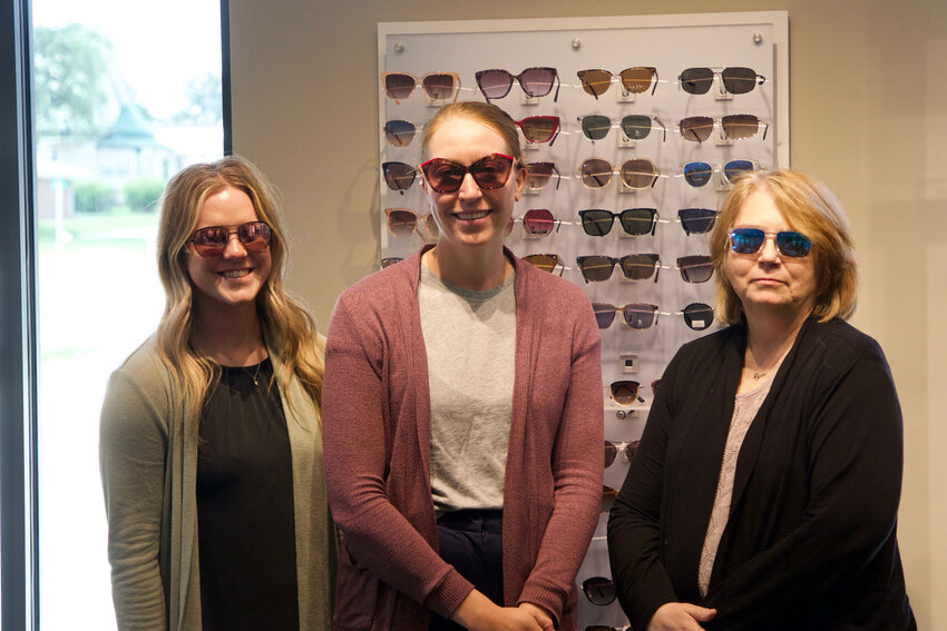 From left, Sam Skillett, Sam Fiala and Michelle Schoenrock showcase their favorite sunglasses.