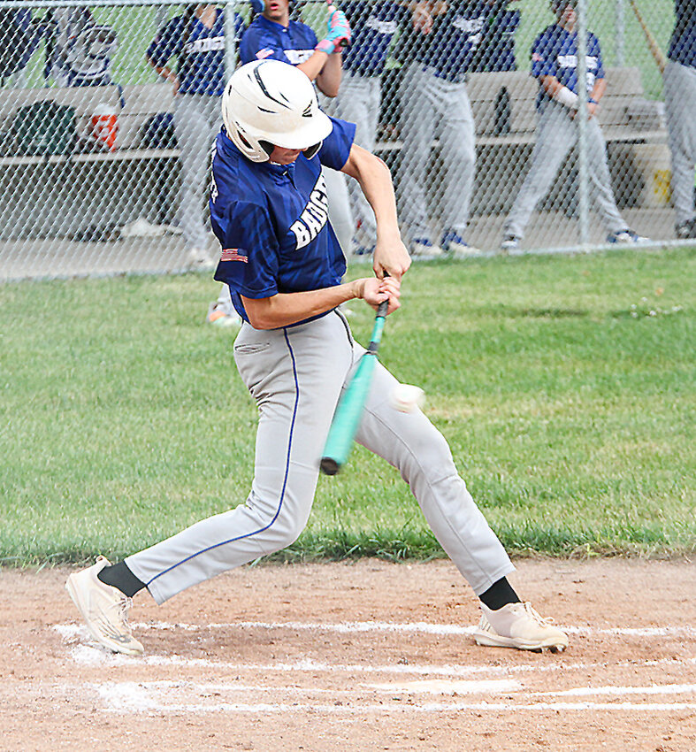 Devin Slawnyk of UBC fights off an inside pitch against Tri County June 30.