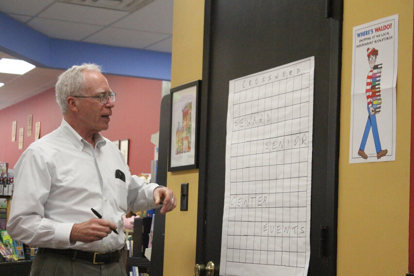 Fred Ohles shows how he starts building a crossword puzzle Sept. 18.