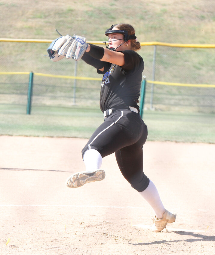 McKenna Sides of Seward winds and delivers a pitch against Crete in the Central Conference tournament semifinals Oct. 3. Crete won the game 9-3.