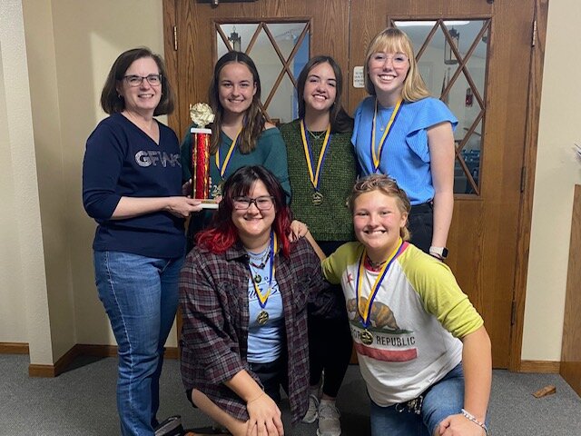 A team from Seward High won the large school division of the girls' only quiz bowl Oct. 2 in Seward. Team members are, from left: (front row) Kayla Albright and Ava Slechta; and (back row) Kathy Huggins, GFWC NFWC State President; Emma Matulka, Maddelyn Larson and Addilyn Sugden.