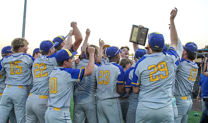 The Seward baseball team celebrates its district championship win over Norris May 9. The win put the Bluejays in the state baseball tournament for the first time since 2019. See more on sports.