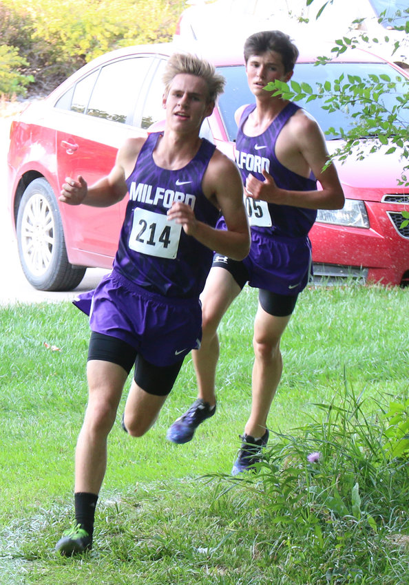 Elliott Reitz (214) and Kaleb Eickhoff of Milford run together at the Milford Invitational Sept. 9. They finished first and second, respectively.