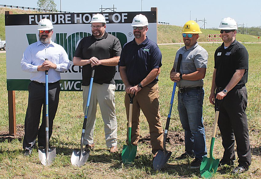 Pictured are, from left to right: Karl Miller, president of the City Council; Mayor Josh Eickmeier; Nathan Foster, regional manager of WCR; Troy Bridgford, Ironhide and Jonathan Jank, Seward County Chamber and Development Partnership.