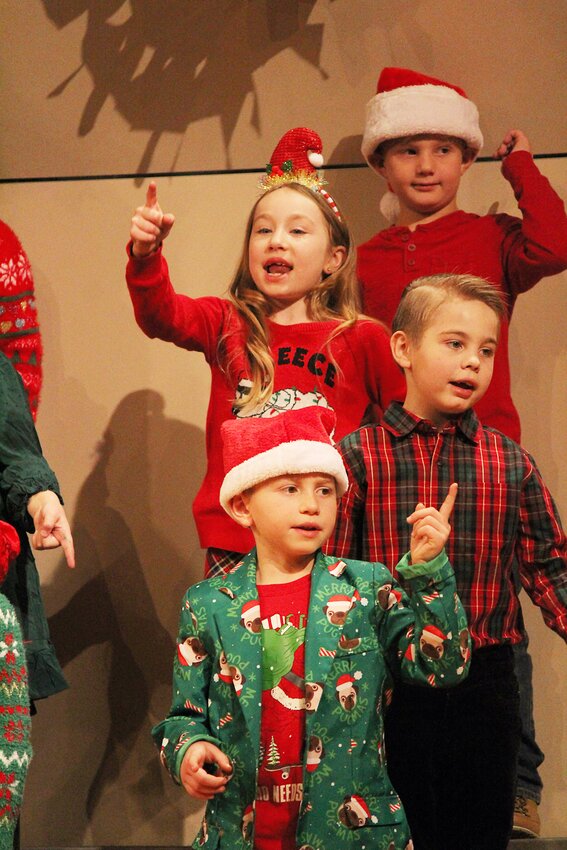 Milford Elementary kindergarten and first grade students performed  their Christmas program, &ldquo;Crazy Carols!&rdquo; on Dec. 12. Doing their part in the performance were, from bottom to top, Emmett Verwey, Greyson Teschendorf, Mercedes Timm and Urban Roth.