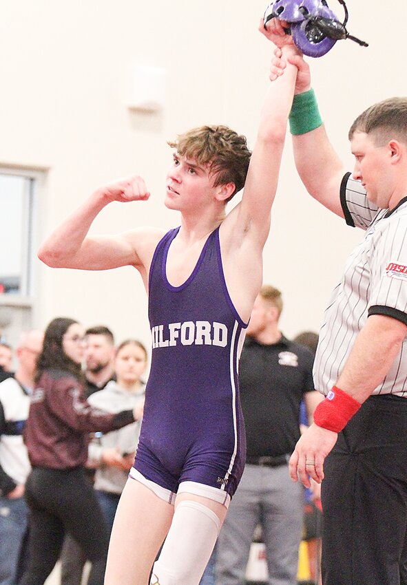Garrett Schoen celebrates  a win in the consolation semifinals at districts Feb. 10. The two are among five Milford Eagles who qualified for the state wrestling tournament, which starts Thursday, Feb. 15, in Omaha.
