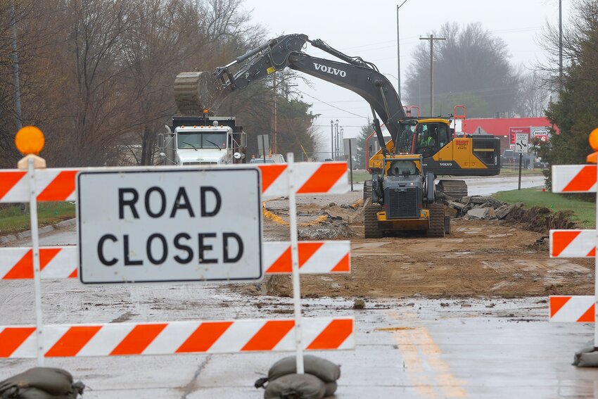 Workers tear up U.S. Highway 6 on the north side of Milford April 1 as work begins on highway reconstruction.