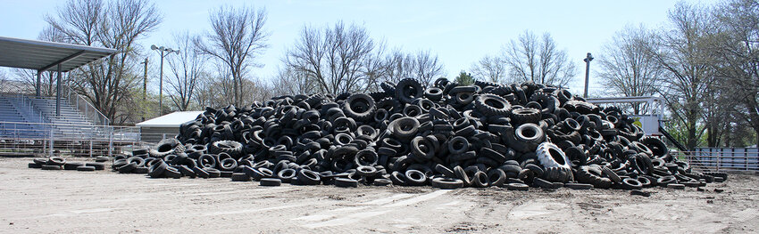 The pile of tires collected April 19 was taller than the crow's nest at the Seward County fairgrounds arena.