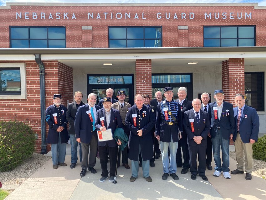 Members of the Sons of the Union Veterans of the Civil War, Department of Nebraska and the Dakotas stand in front of the NENG Museum. They attended the 24th annual encampment in Seward recently.