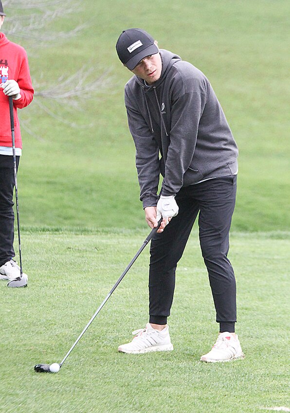 Sam Ehlers of Centennial looks down the ninth fairway as he prepares to tee off during the Crete Invitational April 26.
