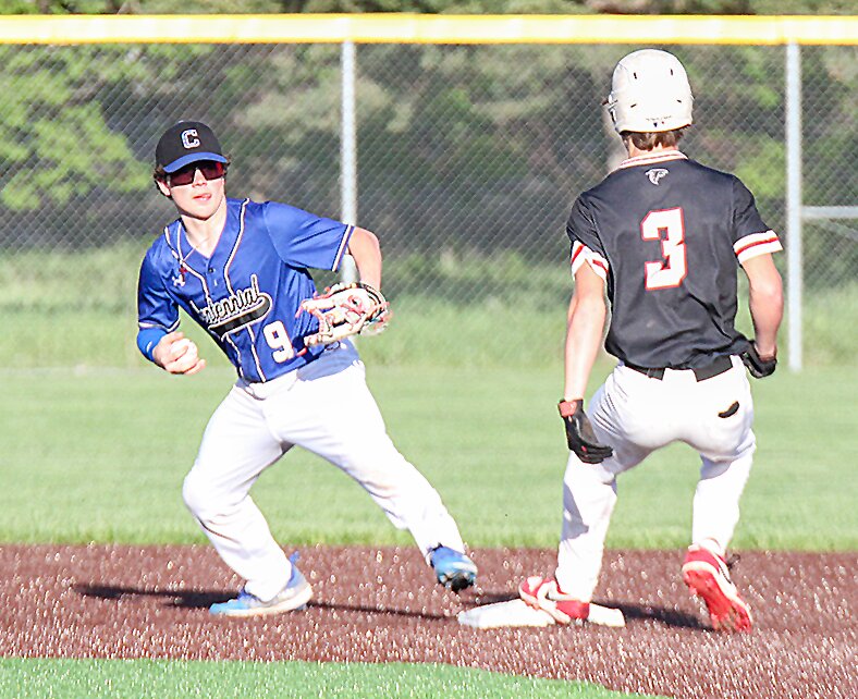 Jack Wellman of Centennial watches a pitch go past in the Broncos' district game against DCW May 2.