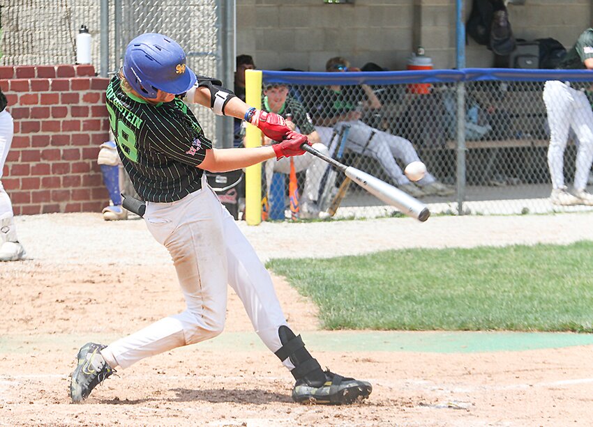 Carter Gardiner of Seward ZKE Post 33 Prep stretches to tag the ETC runner in a run-down June 14.