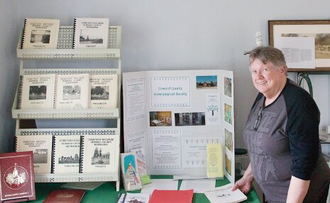 Joan Shurtliff is shown in a section of the growing collection of records and information at The Genealogy House.