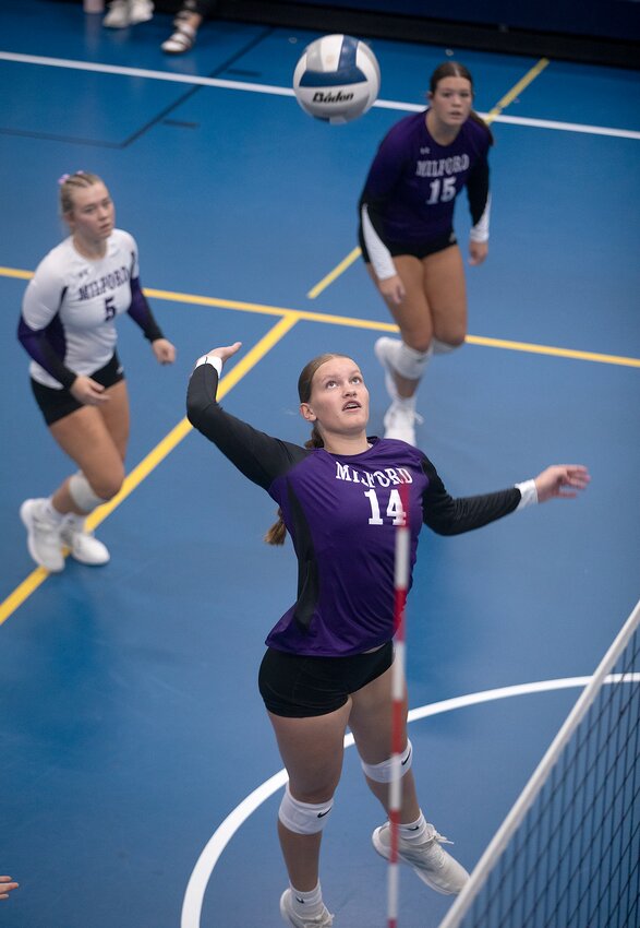 Milford's Libbie Reil serves against Fairbury at the Malcolm Boosters Tournament Sept. 14.