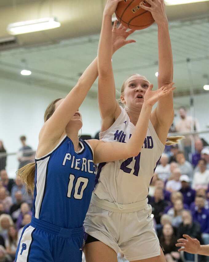 Milford's Abby Crabtree puts up a shot against Pierce in the Eagles 46-39 victory that earned them a berth in this week's state basketball tournament.