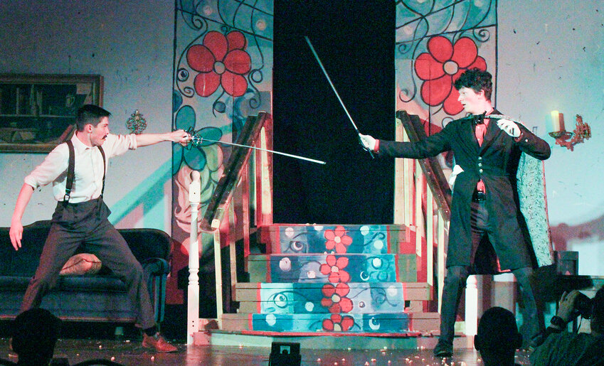 Jacob Riis (Sam Lannin), left, and Clarence Claude Van Cleesvf III (Malachi Miller) battle for the hand of the lovely Idabel Treason in ”Adrift in the Wicked City, or… the Miser’s Secret,” the 2025 production by the King's Players. The show will be presented Feb. 26-March 1 at Olde Glory Theatre in Seward.