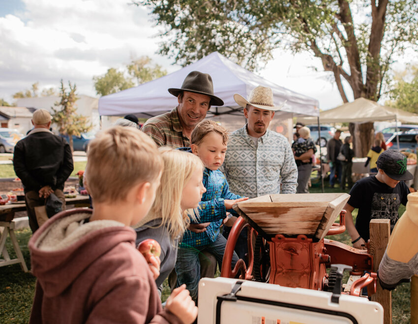 This 2021 photo shows James Thorneycroft running the apple press at the Heritage Festival.