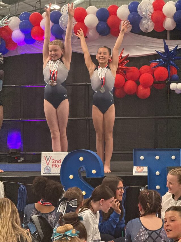 Kayden Right and Norah Herland placed second in beam in Denver. Herland was the state champion for vault.