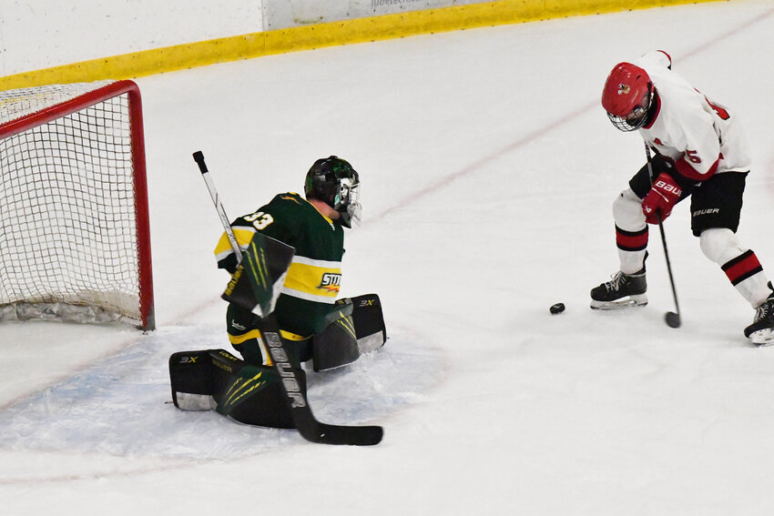 Sauk Rapids-Rice senior goaltender Zander Parker sprawls to make one of his 28 saves as the Storm faced Monticello in the Section 5A quarterfinals Feb. 20 at Moose Sherritt Ice Arena in Monticello. The Moose scored two third-period goals on their way to a 3-0 win.