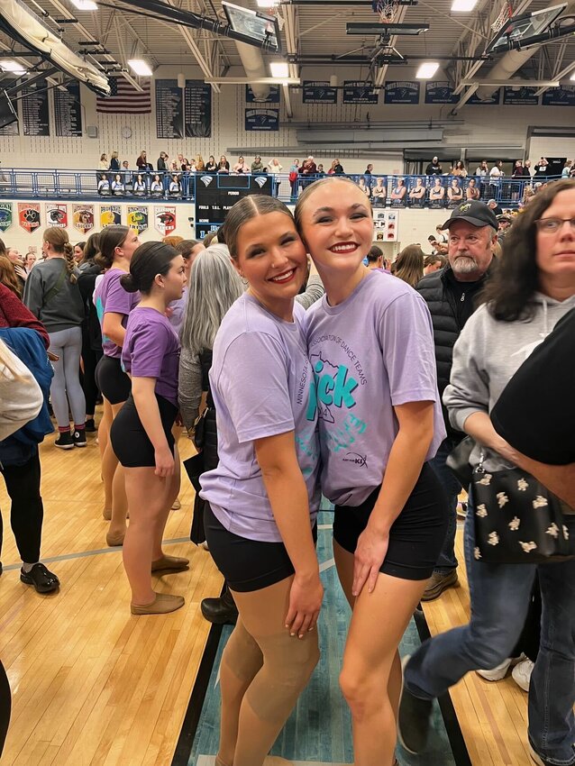 Foley Falconettes senior dancers Marisa Spiczka (left) and Laura Dohrmann celebrate a successful MADT All-State event March 2 at Eastview High School in Apple Valley. Spiczka and Dohrmann have each represented the program for six seasons.