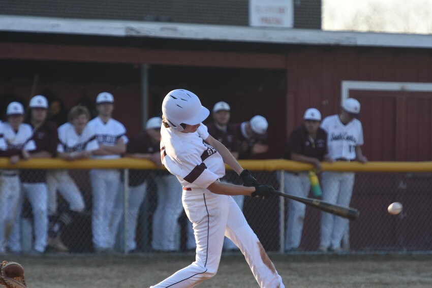 Sophomore Will Hoffman makes contact with the ball during the doubleheader sweep over West Central Area April 9 in Sauk Centre. Sauk Centre won 10-0 and 6-1.