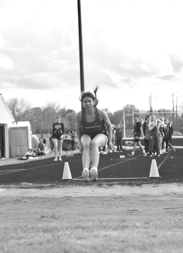 Nina Thieschafer competes in the Long Jump event on May 7 at the Section 5A true team meet in Montevideo. Thieschafer ended with a final distance of 14 feet and 7.5 inches.