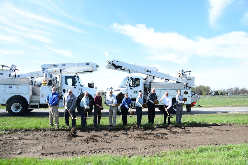 Stearns Electric Association Board of Directors Bob Niehaus (from left), Jerry Fries, Scott Dirkes, Arlyn Lawrenz and Eric Peterson; chief executive officer Matt O’Shea; and directors Michael Cramer, Jeff Koehler, Greg Blaine and Randy Rothstein move dirt May 6 during a groundbreaking for a new operations center and headquarters in Melrose. Attending were project partners from the city of Melrose, GLTArchitects, W Gohman Construction as well as Stearns Electric employees and member-consumers.