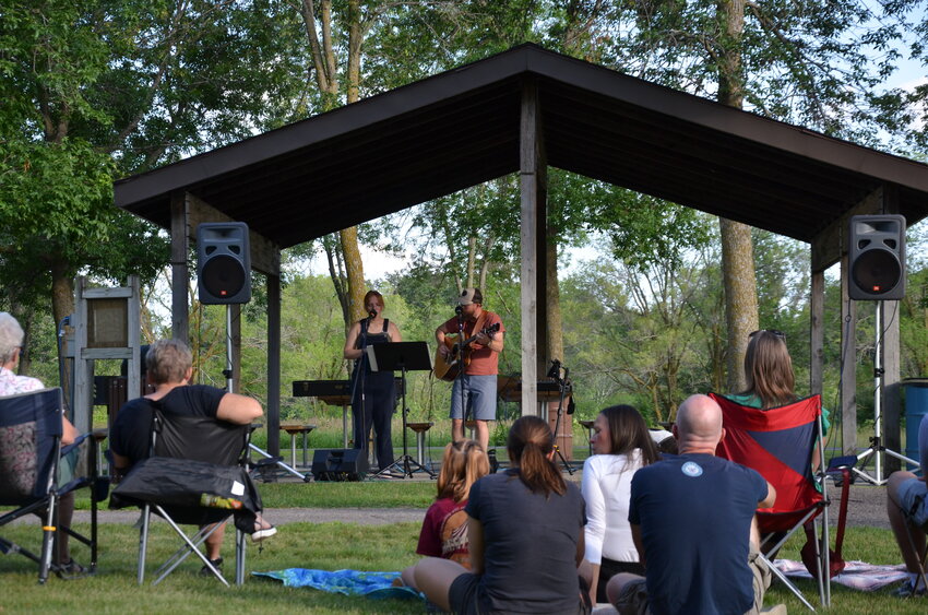 A  crowd of spectators listens to live music from Elle and Jeremy Johnson during the Foley Quality of Life Task Force’s Party in the Park July 18 at Holdridge Park in Foley. The event marked the 10-year anniversary of Foley Quality of Life Task Force’s Party in the Park events.