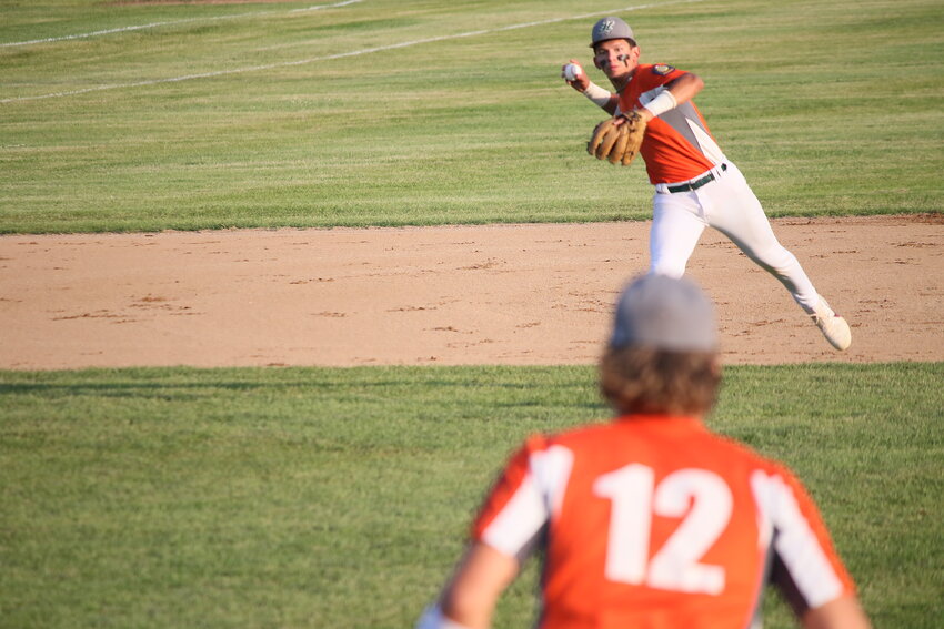 Holdingford shortstop Luke Bieniek throws to first to retire the first Paynesville batter July 18 in Paynesville. Bieniek assisted on the final out of the game, preserving a Holdingford win.