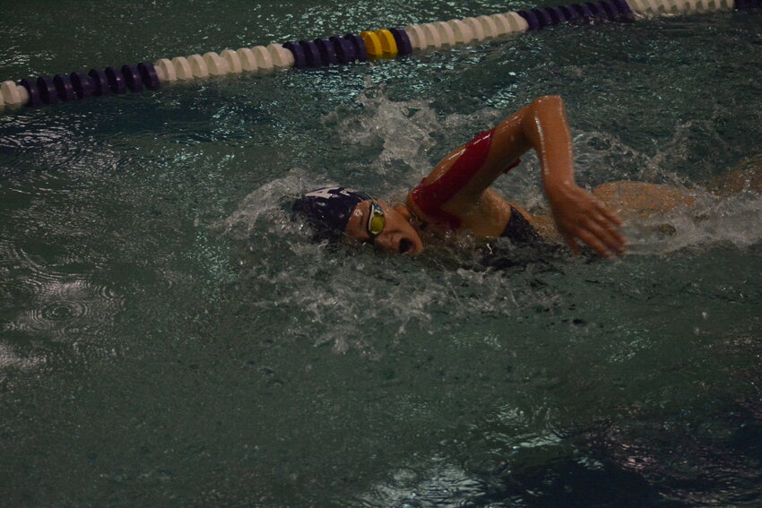 Albany’s Rayvin Pullins competes in the 200-yard freestyle against Little Falls Sept. 12 at Albany Area High School in Albany. Pullins finished third in the race, while teammate Mckenzie Eiynck took first.