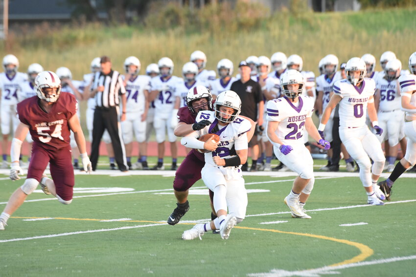 Senior defensive tackle Jayden Randall sacks Albany quarterback Boone Roemeling during the first half of their game Sept. 13 in Sauk Centre. Sauk Centre lost the game 53-20. The Streeters play at Melrose Sept. 20.