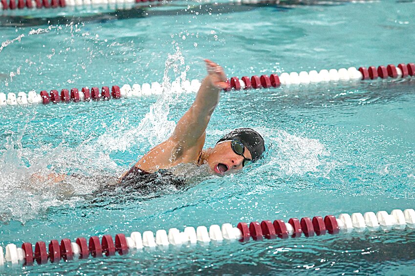 Pyper Vogt takes a huge gulp of air during an intense 100-yard freestyle race against Foley Oct. 3 at Sauk Centre High School in Sauk Centre. Vogt won a pair of freestyle events for the Streeters, who fell to the Falcons 101-85.