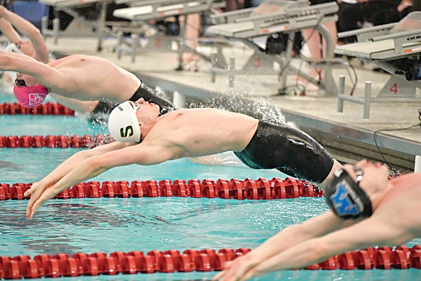Sauk Rapids-Rice senior Garret Broman springs from the wall at the start of the 200-yard individual medley preliminaries at the Minnesota State High School League Class AA Boys Swimming and Diving State Meet March 7 in Minneapolis. Broman placed seventh in the 100 backstroke and 13th in the 100 butterfly in the March 8 finals.