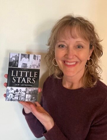 Jan Lefebvre, on Feb. 20 in St. Joseph, displays “Little Stars,” a fiction novel she wrote based on the Central Minnesota lives of her uncles, Mel and Clarence Thelen, and her father, Herb Thelen. Lefebvre said her characters are like little stars that people do not notice yet they are important and make a difference if you take the time to see them.  