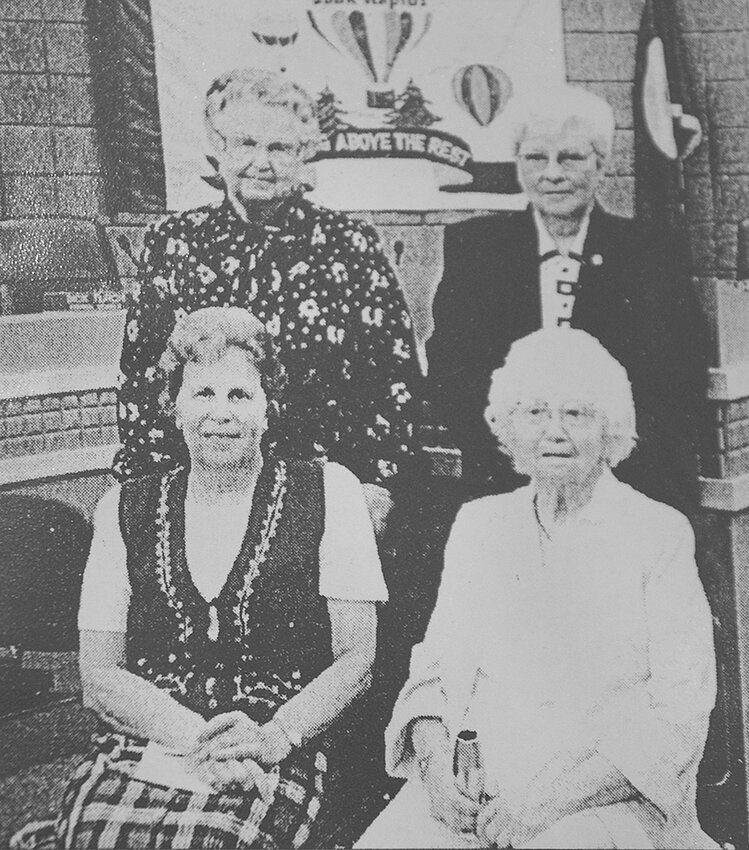 Benton County’s first Women Making History honorees — Lu Neils (front, from left) and Mildred Benner; (back, front left) Lola Schenk and Elaine Fleck — smile during the 1998 event hosted by Benton County Historical Society and Sauk Rapids Women of Today. From 1998 to 2019, the Benton County Historical Society recognized more than 100 local women for their outstanding impacts.