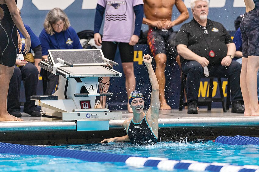 Bryn Greenwaldt raises her fist in the air in celebration after finishing in under 22 seconds in the 50-yard freestyle at the NCAA Division II Women’s Swimming and Diving Championships March 12 at the Indiana University Natatorium at Indiana University in Indianapolis, Indiana. Greenwaldt became the first women’s swimmer in Division II history to ever achieve the feat.