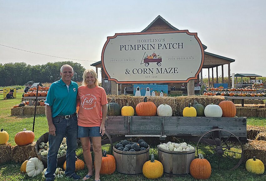 Al and Geralyn Hoefling at their pumpkin patch near Marcus. The couple plants pumpkins for the season in May.