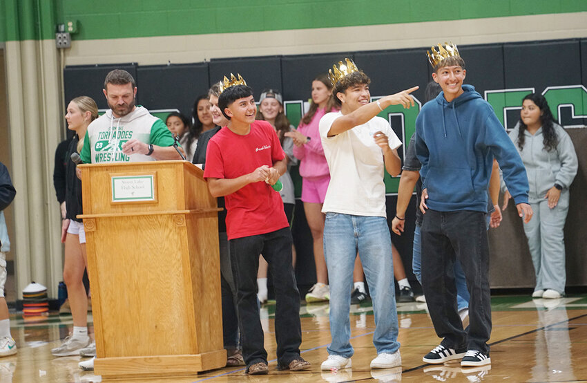 At the pep rally last Friday are, homecoming candidates, from left: Emmanuel Negrete, Patricio Hernandez and Iker Gomez, with SLHS Principal Matt Doebel.