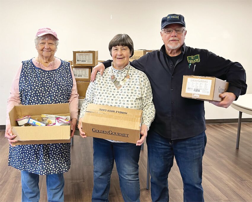 From left: Jan Hallengren and volunteers Carol and Bob Blodgett.