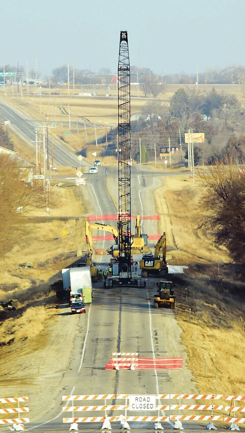 Looking west, workers began dismantling the Hwy. 3 bypass bridge last week. The new bridge is expected to be completed sometime in November.