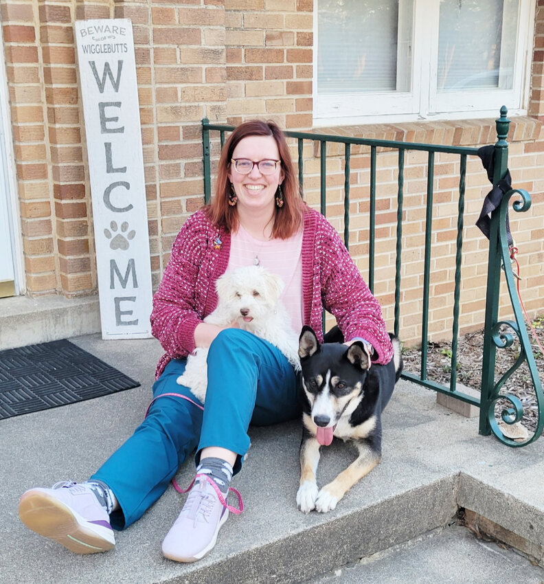 Grace Weiland with her dogs Daisy and Diesel.