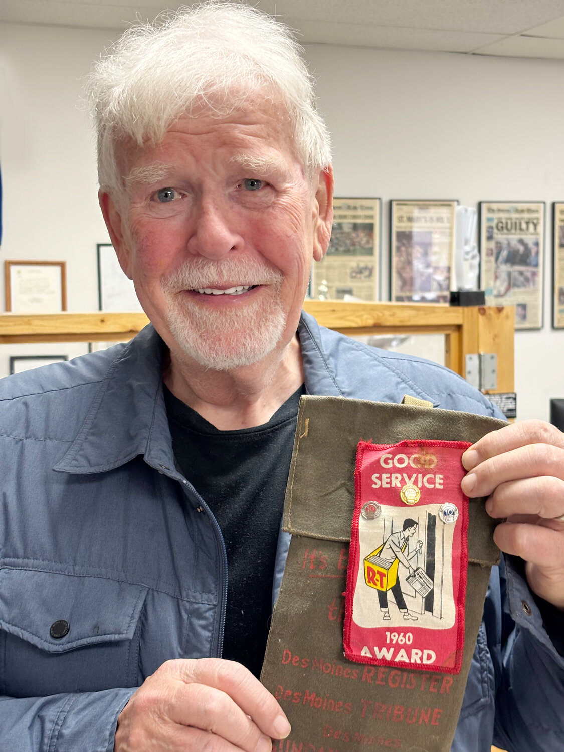 The Des Moines Register used pins and awards to motivate their carriers. Writer Rick Wimer still has his.
